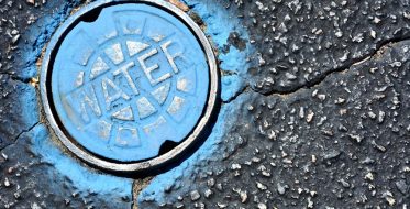 Blue Water Main on Asphalt — Leak Detection in Tweed Heads, NSW